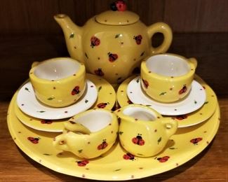 Yellow and red ladybug tea set