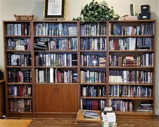 Lots of books and Teak Bookcases