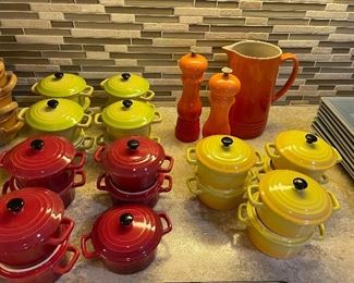 individual crocks:  green, red, yellow ; le creuset S&P pitcher