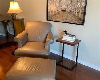 Leather chair (38" x 37" x 29") and ottoman (16" x 29" x 22") large framed acrylic (43" sq.); Bronze metal floor lamp 