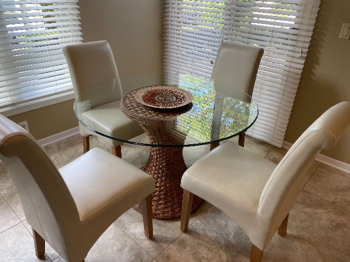 Glass-topped 45" round table with 4 chairs -