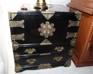 one of a pair of black lacquer chests
