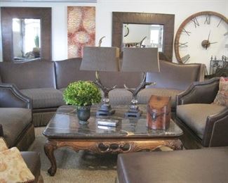 A Large  Sectional with 2 matching Armchairs and 2 Ottomans.