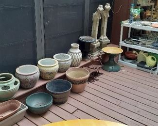 Frank Lloyd Wright "sprites", pottery planters, garden, sun dials