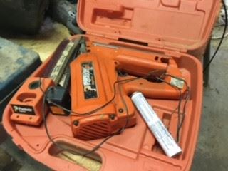Framing gun Nails, battery, charger and gas price $50