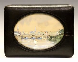Lot 27: A late 19th century French tea caddy.  Leather covered wood case in rectangular form with inset watercolor view of Paris with bridges over the Seine.  Opens to reveal a single compartment interior with leather covered lid.  Some surface wear.  6 1/2 x 5 x 5 1/4 high overall.  ESTIMATE $200-300