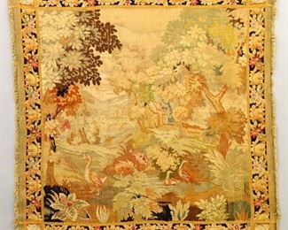 Lot 67:  An 18th century Flemish tapestry.  Woven multicolor landscape design depicting geese at water's edge.  Very faded, edge damage, multiple repairs.  76 x 80" high overall.  ESTIMATE $800-1,200