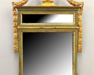 Lot 68: A late 18th century French Louis the XVI Period mirror.  Carved wooden construction with Gesso detail, foliate wreath crest with floral swags, and original two-part mirror glasses.  Green painted finish with Gilded detail.  Some surface wear, several older repairs and touch-ups.  30 x 49" high overall.  ESTIMATE $800-1,200