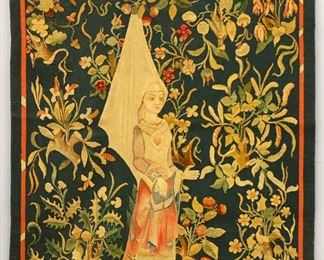 Lot 74: A 19th century French Aubusson tapestry.  Woven multicolor tapestry depicting a Medieval style noblewoman surrounded by fruit trees and flowers.  Signed "L.T. Aubusson" lower right.  Some wear and fading, small pulls and areas of thinning, linen backing removed.  43 1/4 x 53 1/4" high overall.  ESTIMATE $800-1,200