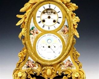 Lot 89: A Very Good 19th century French Gilded Bronze mantel clock retailed by "Martin Baskett & Cie, Paris".  8-day time and strike movement with visible escapement, a two-part porcelain dial with Roman numerals over a lower calendar dial with outer month indicator and subsidiary day and date dials below a circular moon phase indicator aperture.  Crisply chased Bronze case with a very good Gilded finish decorated with ribbon, foliate, fruit and floral motifs with inset hand-painted porcelain allegorical panels featuring cherubs representing the Spring, Summer, Autumn and Winter seasons all standing on squat gadrooned feet.  Dial and movement both marked "Martin Baskett & Cie, Paris" with the serial number "4001" on the movement.  Very slight wear to the Gilding, faint hairlines in dials, running when cataloged.  16 1/2" high.  ESTIMATE $6,000-8,000