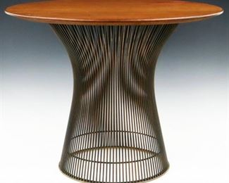 Lot 110: A mid 20th century Warren Platner for Knoll side table.  Teak round table top on cylindrical Steel rod base with shaped waist.  "Knoll" label at underside.  Some wear, discoloration and minor loss to finish at top.  24" diameter x 18 1/2" high overall.  ESTIMATE $400-600