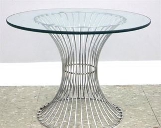 Lot 114: A mid 20th century Warren Platner for Knoll side table.  Glass round table top on circular Steel rod base with shaped waist.  Some surface wear, light scratches and oxidation to patina.  26" diameter x 19 1/2" high overall.  ESTIMATE $300-500