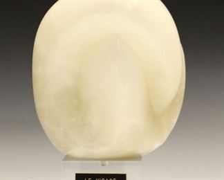 Lot 123: Joel Shapses, American, b. 1945.  A 1970's Alabaster abstract sculpture, titled "Le Virage".  Signed "J. Shapses" and dated "'75" at underside, titled plaque on plexi base.  Some surface wear and small dents to Alabaster, light scratches to base.  Approximately 7 x 6 x 10 1/2" high overall.  ESTIMATE $200-400