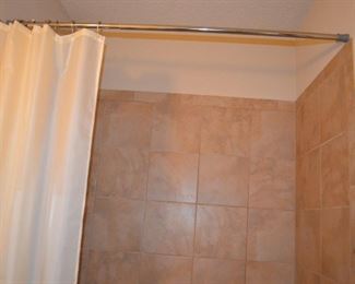 SHOWER CURTAIN AND SHOWER ROD