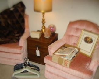 upholstered arm chairs, brass lamp