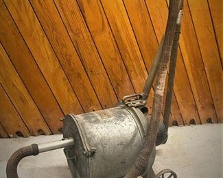 Early 1910s vacuum cleaner by Western Electric..........To register and to place bids go to https://capitolsalesservices.hibid.com/ 