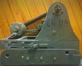 US Signal Corps US Army cable reeling machine that can be either motor-driven or hand cracked.  This can mount  on back of small jeep or truck to lay-out or recover field telephone wire 