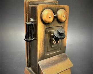 Coin bank in the form of an antique oak wall telephone for the St Louis Telephone Employees Credit Union