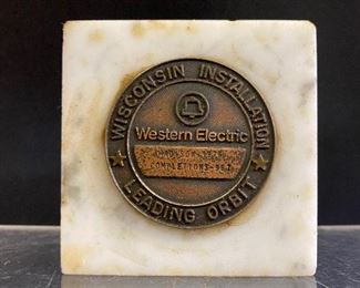 Paper weight for Western Electric Wisconsin Installation Leading Orbit. 