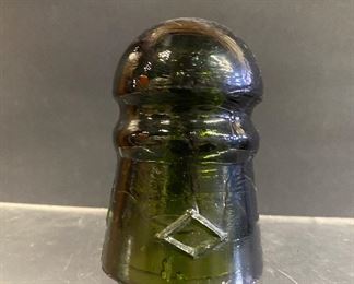 Old green glass embossed diamond insulator