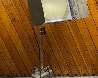 A vintage Photogenic Speed Light by the Photogenic Machine Company of Youngstown, OH