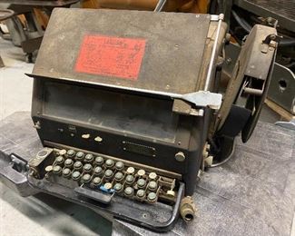 Early 20th century teletype machine.........To register and to place bids go to https://capitolsalesservices.hibid.com/ 