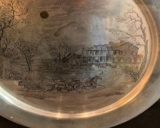 Each plate has a different Currier & Ives picture.