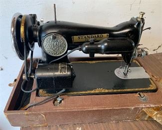 lot 31- vintage standard sewing machine $65