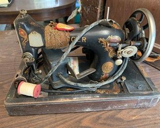 lot 33- Vintage Singer sewing machine- needs work $125