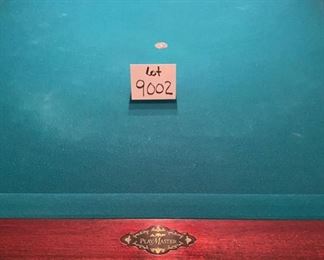 Lot 9002-A $1595.00. AMF 8' Pool Table, Stately table crafted in cherry, with green felt table  and sides, leather pockets, claw and ball feet, includes balls, triangle, all accessories, 4 pool cues and a bridge. If you've been looking for a pool table that looks as great as it plays, this is your table!