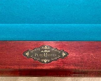 Lot 9002-A $1595.00. AMF 8' Pool Table, Stately table crafted in cherry, with green felt table  and sides, leather pockets, claw and ball feet, includes balls, triangle, all accessories, 4 pool cues and a bridge. If you've been looking for a pool table that looks as great as it plays, this is your table!