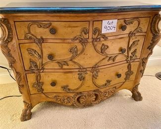 Lot 9004. $225.00. Four-Drawer chest with Dark Stone Top, Carved Drawers, Legs and Trim.  Unbranded, Bombé Style 42"w, 18.5"d, 31.5 " High.  Very functional and good looking table!  Middle drawer needs glider reattached.
