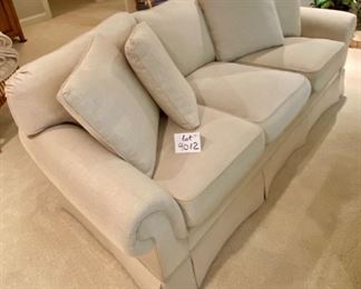 Lot 9012. $1,395.00 Vanguard American Bungalow Main Street Sofa in  cream Color, Purchased at Toms-Price.  Includes:  4 pillows, rolled arms, high-end fabric.  86" W  x 35" Deep,  We think it is down and very comfy. 