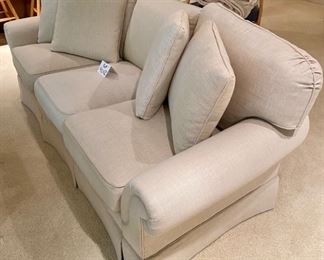 Lot 9012. $1,395.00 Vanguard American Bungalow Main Street Sofa in  cream Color, Purchased at Toms-Price.  Includes:  4 pillows, rolled arms, high-end fabric.  86" W  x 35" Deep,  We think it is down and very comfy. 