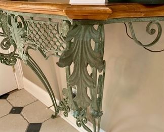 Lot 9030. $375.00.  BEAUTIFUL Ethan Allen Country French Legacy Forged Iron Console Table. This must be attached to a wall. There are two brackets attached on the back of the table for you to attach to the wall. Screws not included. This is a beautiful piece in very nice condition, used here as a foyer table to collect your mail or place a mirror over it.  Wonderful craftsmanship that only Ethan Allen knows how to accomplish!  Currently selling second hand for $650 online.
