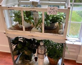 Lot 9037.  $225.00. Unique Shabby Chic Greenhouse/plant holder atop a galvonized steel shelf on a legged tray.  53" tall, 19" deep and 31" wide.  This would be a great piece to start seeds in, display plants, or even would make an interesting miniature garden or display.  Stone Figurines and plants not included. Love this piece!