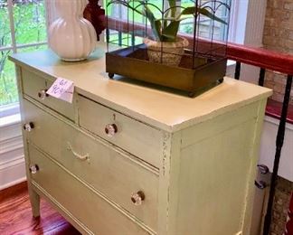 Lot 9040. $85.00. Darling Antique painted Green Shabby Chic 4 drawer dresser, measures 40" w x20" deep x 33" high.  Dove-tailed construction with glass knobs that will either need to be replaced or tightened.  Perfect piece for holding a flat screen tv, works in a bedroom, family room, foyer, actually any room in the house, with nice storage.  