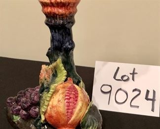 Lot 9024. $120.00 for A pair of  Ceramiche Fruited candlesticks, in cobalt blue with colorful, raised fruit base.