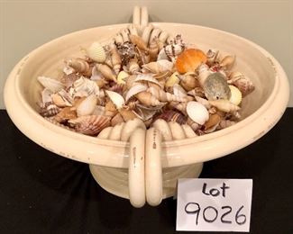 Lot 9026. $110.00 Pippo Torcivia pedestaled bowl, perfect for a large table or sideboard decor.  Includes beautiful collection of shells.	20" W x 8" T x 16" Diam