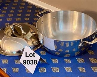 Lot 9038.  $150.00 All-Clad Double Handled Dutch Oven with Lid. 5" T x 10.5" diam. Excellent Condition and phenomenal cooking experience.  Domed lid self bastes, A favorite of all great cooks everywhere!  I think this is a 4 quart Dutch Oven, by the way.  