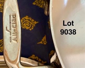 Lot 9038.  $150.00 All-Clad Double Handled Dutch Oven with Lid. 5" T x 10.5" diam. Excellent Condition and phenomenal cooking experience.  Domed lid self bastes, A favorite of all great cooks everywhere!  I think this is a 4 quart Dutch Oven, by the way.  