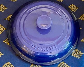 Lot 9042. $125.00. LeCreuset 10.34  Never Used Stoneware Baker with Lid in Lapis Blue.  Base 3.5" T x 8" diameter. The.Best.Cookware.In.The.World.  ;-)