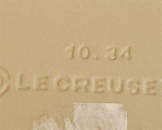 Lot 9042. $125.00. LeCreuset 10.34  Never Used Stoneware Baker with Lid in Lapis Blue.  Base 3.5" T x 8" diameter. The.Best.Cookware.In.The.World.  ;-)