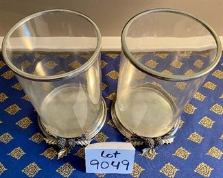 Lot 9049. $125.00  for Pair of Williams-Sonoma Pewter Holly Hurricane Lamps 10" T x 6.25" diameter. The hurricanes would look festive with Christmas pillar candles beneath!