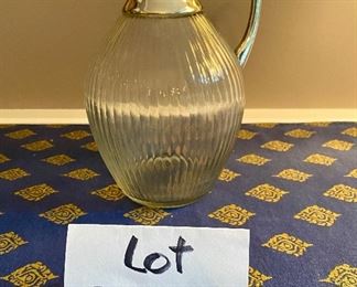 Lot 9051 $25.00  Ribbed Glass Pitcher with Silverplate handle and spout - no brand or signature 9.5" x 6.6" d.