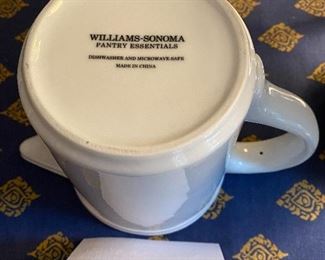 Lot 9060. $42.00. for 2 Williams-Sonoma White Pitchers -larger measures 9.5"t,x7.5" w and smaller is 6"t x 8.5" w.  These would even look beautiful holding a bouquet of daisies or other posies!!  