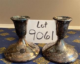 Lot 9061. $38.00. Pair of Hurricanes over Silverplate candlesticks by International Silver Co.  Hurricanes 14" t x 6" w and candlesticks are 4"t. Looks like these need a little polish!  