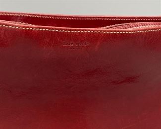 Lot 9150.  $48.00  Vintage Kate Spade Red Leather Zip Top Purse, 12x8x3-1/4" deep, made in Italy - Great classic style and the color is a beautiful hue of red, one handle,  Grab this quick; it won't last and unfortunately, Kate won't be designing anything anymore.  :-(