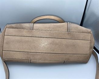 Lot 9135. $125.00. Like New Frye Leather Satchel Handbag in Exc. Condition, with 2 handles and a removable strap for cross-body or shoulder use.  This model may be called the Melissa, but don't quote me.  Zip pocket interior plus two slip pockeets.  Measures approx. 15"x11"x4.5" deep,.  A classic, very attractive handbag that you will be proud to carry.  New comps for this I've seen online for $338.00.  Frye makes fabulous leather purses!