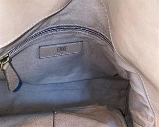 Lot 9135. $125.00. Like New Frye Leather Satchel Handbag in Exc. Condition, with 2 handles and a removable strap for cross-body or shoulder use.  This model may be called the Melissa, but don't quote me.  Zip pocket interior plus two slip pockeets.  Measures approx. 15"x11"x4.5" deep,.  A classic, very attractive handbag that you will be proud to carry.  New comps for this I've seen online for $338.00.  Frye makes fabulous leather purses!